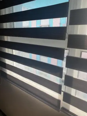 a close up of a window with blinds at studio flat at 101 Newport Boulevard in Manila
