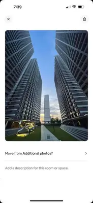 two tall buildings are next to each other at fame residence staycation in Manila