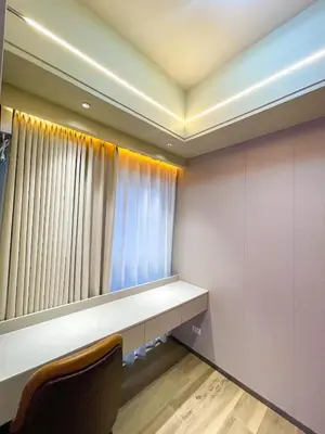 a room with a desk and a window at Bayshore 9g 4br in Manila
