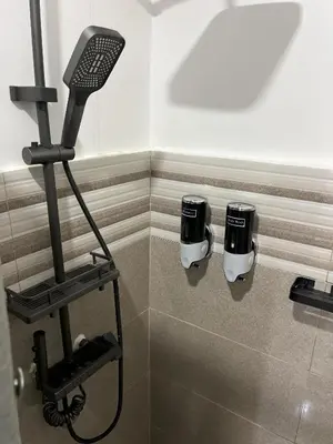 a room with a hair dryer and a hair dryer at Cozy Studio near MOA, Airport & Star City, Pasay in Manila