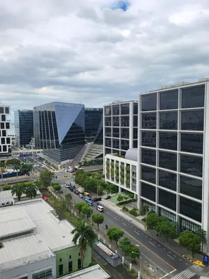 an aerial view of a city with tall buildings at Balay Maria in Manila