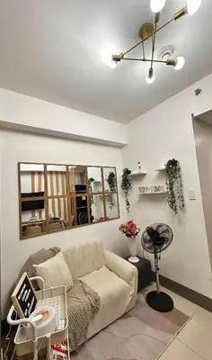 a living room with a couch and a table at Casa Vigonia in Manila