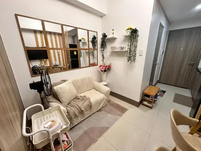 a living room with a couch and a table at Casa Vigonia in Manila