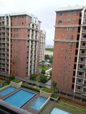 an aerial view of some apartment buildings at Condotel nearby MOA with Pool Access in Manila