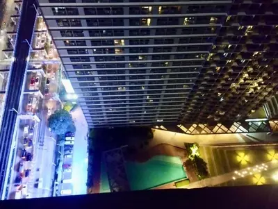 an overhead view of a tall building with a pool at Casa Arville in Manila