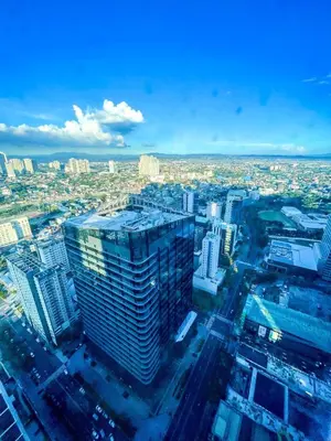 an aerial view of a city with tall buildings at Luxury 2BR Penthouse Across Uptown BGC I Modern in Manila