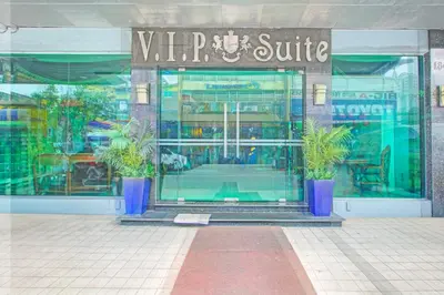 a store front with plants in front of a store at VIP Hostel, Near PNR Pasay Evangelista, Makati Manila in Manila