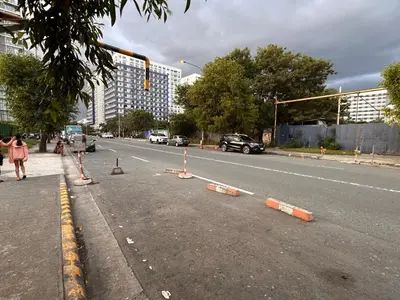 a street with cones on the side of the road at S Residences, Tower-3 in Manila