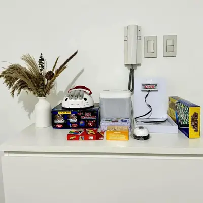 a white counter with items on top of it at Cornelia Street at Azure Urban Resort Residences in Manila