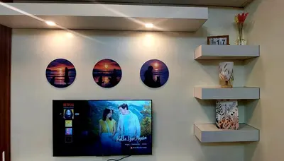 a wall with a poster of a movie on it at 21K Pioneer Woodlands Mandaluyong in Manila