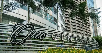 a large sign on the side of a building at Your HOME away from home in Manila