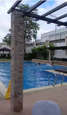 a swimming pool at or near hotel villa margarita at Lyleis' Getaway in Manila