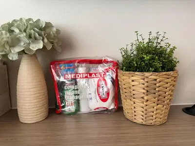 a table with two plants and a bag ofadobeadobeadobeadobeadobeadobeadobe at Einjel's Hideaway in Manila