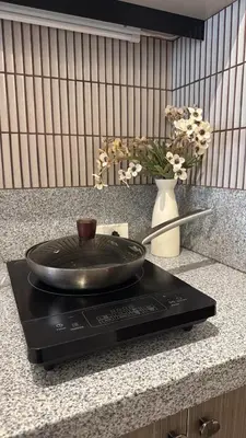 a pan is sitting on top of a counter at Einjel's Hideaway in Manila