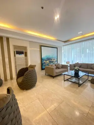 a large living room with a couch and a table at Shore 3 - Unit Chloe - Brand New and Relaxing 1BR in Manila
