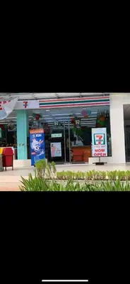 a store front with two signs in front of it at Anuva Staycation by Gina in Manila