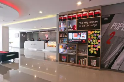 a store with a display case in a mall at Red Planet Makati Amorsolo in Manila