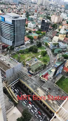 an aerial view of a city with a building at SMDC Light Residences Condominium in Manila