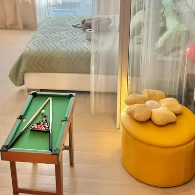 a toy room with a pool table and a bed at Rio West Tower - Azure Urban Resort Residences in Manila