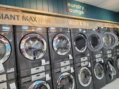 a bunch of washing machines in a store at Condo in Coast Residences, Pasay City in Manila