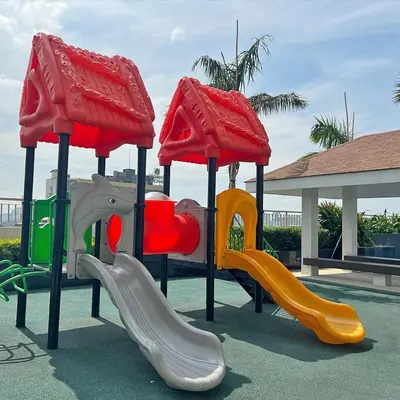 a playground with two slides at Condo in Coast Residences, Pasay City in Manila