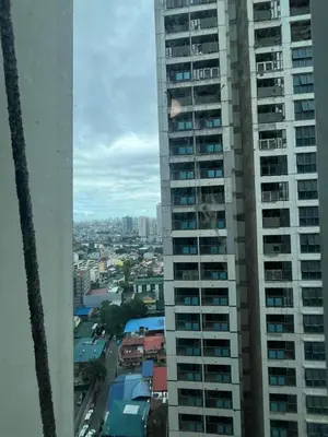 a view of a city from a tall building at The Serenity Tower 2706 in Manila