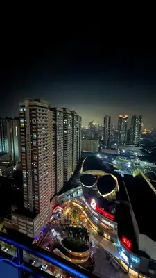 a view of a city at night with traffic at Kiean Leases in Manila