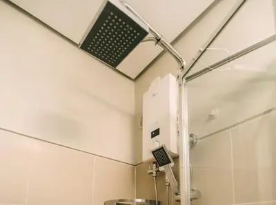 a shower in a bathroom with a shower at 5-Star Feel and Step in Luxury at Fame Residences in Manila