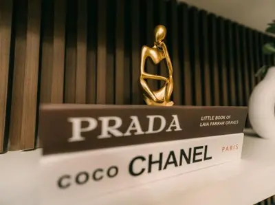 a close up of a coco chanel trophy on a shelf at 5-Star Feel and Step in Luxury at Fame Residences in Manila