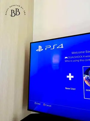 a television screen with the bbc logo on it at Bahay-Bahayan by K&A at Azure Urban Resort Residences in Manila