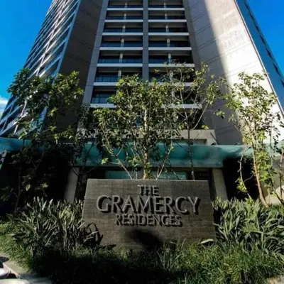 a sign in front of a tall building at Gramercy Residences Spacious 1 BR Loft FREE Amenities in Manila