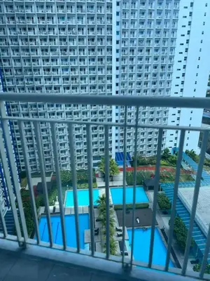 a view from the balcony of a large apartment building at amaya in Manila