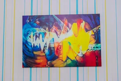 a painting is hanging on a wall at Urban Hideaway Cozy Makati Giggles Swim Gym Park Laugh Eat 3352 in Manila