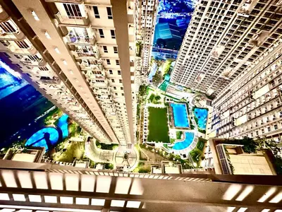 an overhead view of a city with tall buildings at Emmanuel's Lair Prisma Residences in Manila