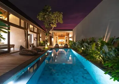 a swimming pool in the middle of a house at warda private villa in Pasong Bayog