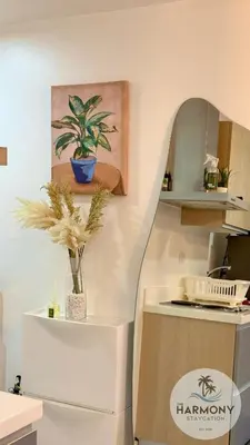 a room with a potted plant on a wall at Azure Residences Staycation - Bahamas tower in Manila