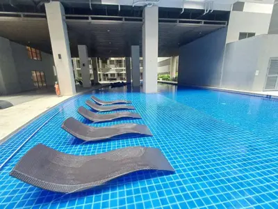 a swimming pool with four swimming mats on the floor at My Staycation moa area S RESIDENCES TOWER 1 in Manila
