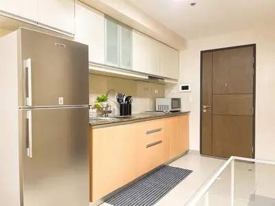 a kitchen with a stainless steel refrigerator at 1BR Condo, BGC Uptown Mall, Grand Hyatt #ournw20j in Manila