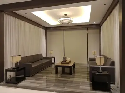 a living room with a couch and a table at Staycation at SHORE 1005 in Mall of Asia near Airport in Manila
