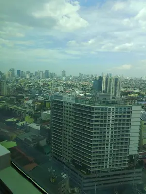 a view of a city from a building at Alphaland Suites Apartment Hotel in Manila