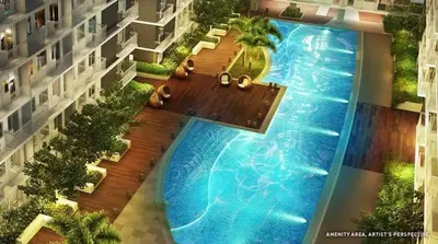 an overhead view of a large swimming pool in a building at Comfort Cove at Shore 3 in Manila