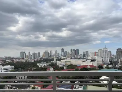 a view of a city from a balcony at Bless View at 16th in Manila