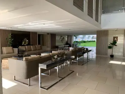 a lobby with couches and tables in a building at PEACETIME CONDO FIELD RESIDENCES BLDG 6 u1006B in Manila