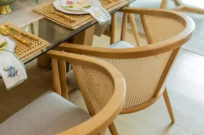 a dining room table with two chairs and a glass table at Tropical Sunset w the best view in BGC plus Netlfix in Manila