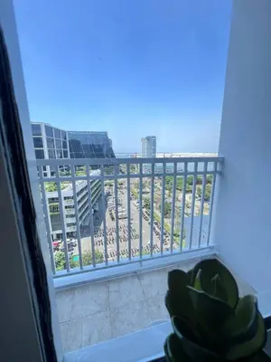 a balcony with a view of a building at Unistay SHORE Residence w Balcony Amazing Manila Bay view near MOA in Manila