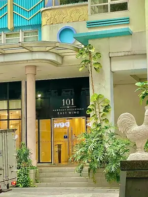 a store front of a building with a sign on it at NAIA Terminal 3 Condo Newport with WIFI Netflix Pool in Manila