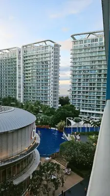 a view of two large buildings in a city at Cozy Apartment Azure Urban Resort Residences in Manila