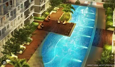 an overhead view of a large swimming pool in a building at Unistay SHORE 3 Tower 2 10th Floor w Balcony Pool View in Manila