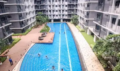 an overhead view of a swimming pool in a building at Unistay SHORE 3 Tower 2 10th Floor w Balcony Pool View in Manila