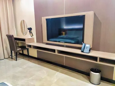 a large flat screen tv in a hotel room at Skyport Hotel in Manila